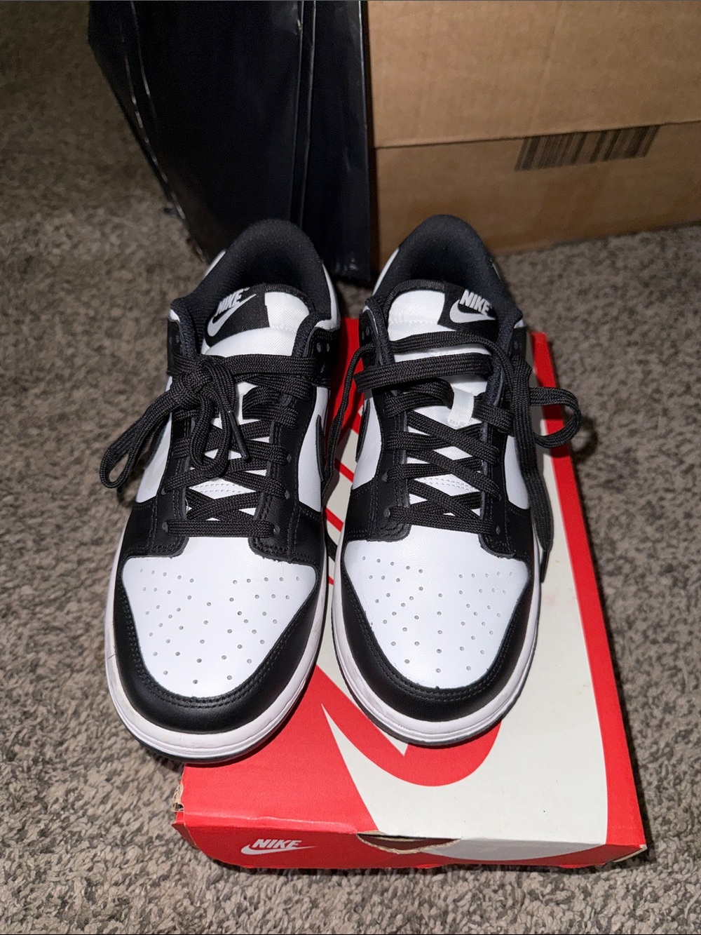 Nike women’s  Black and White Low-Top Sneakers — Classic Two-Tone Design
